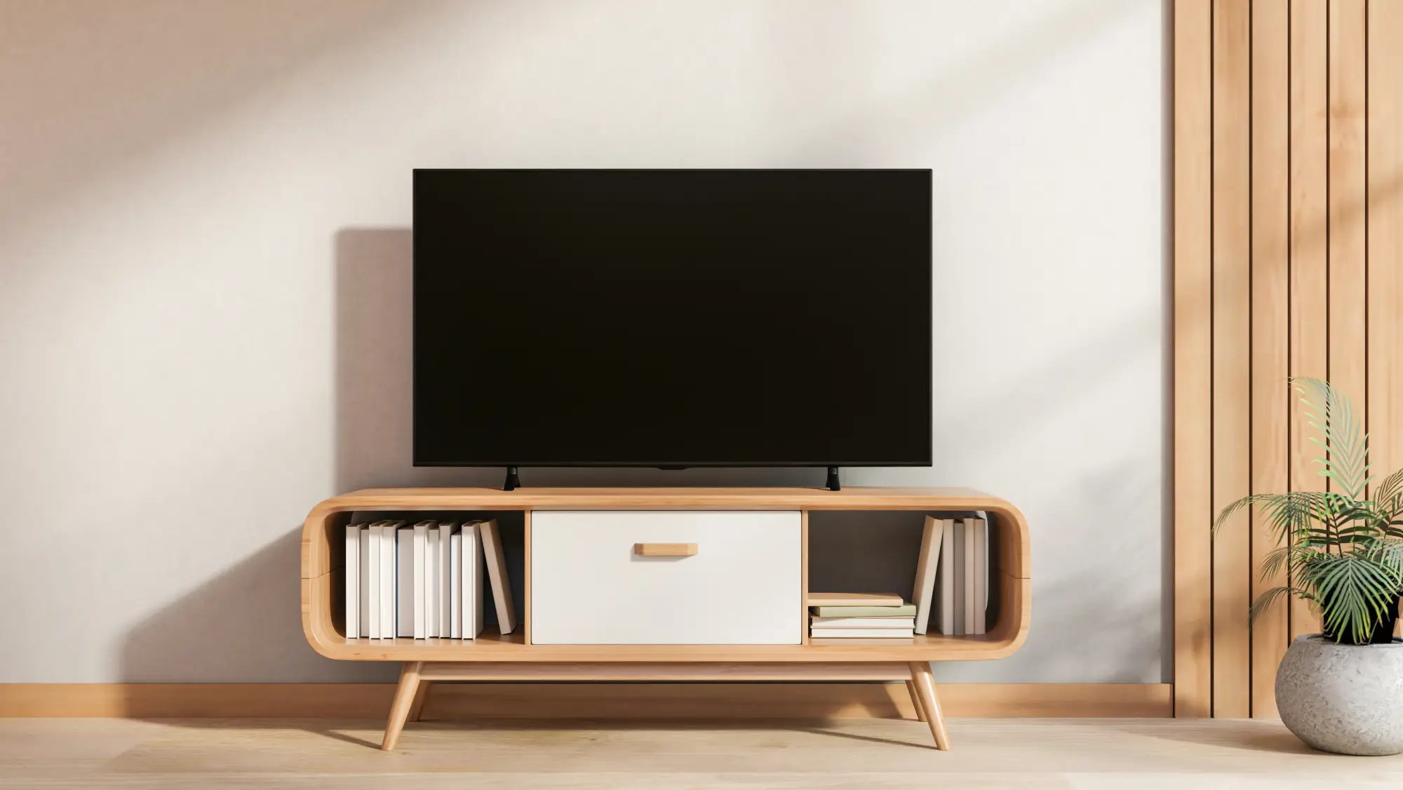 Moderner Holz-TV-Schrank mit weißer Schublade und Bücherregal unter Flachbildfernseher an weißer Wand